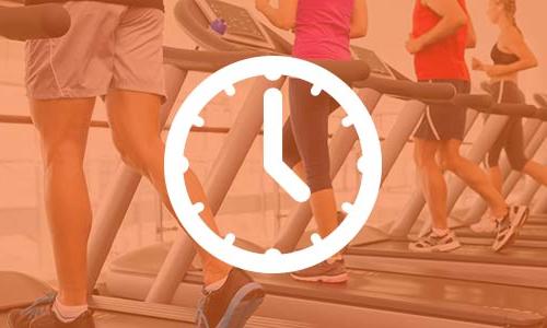 lower angle of people working out on a treadmill with an icon of a clock on top